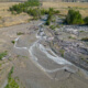 Drought conditions dried up a salmon-bearing river near Kamloops, B.C., leaving narrow channels and dried up habitat.