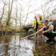 A group of researchers samples the Chase River for contaminants near a bridge. Photo: Vancouver Island University